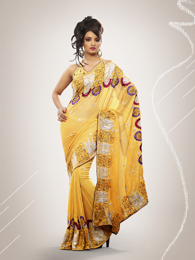 Manufacturers Exporters and Wholesale Suppliers of Yellow Georgette Saree SURAT Gujarat