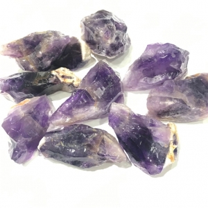Manufacturers Exporters and Wholesale Suppliers of African Amethyst Rough Stone Gemstone Jaipur Rajasthan