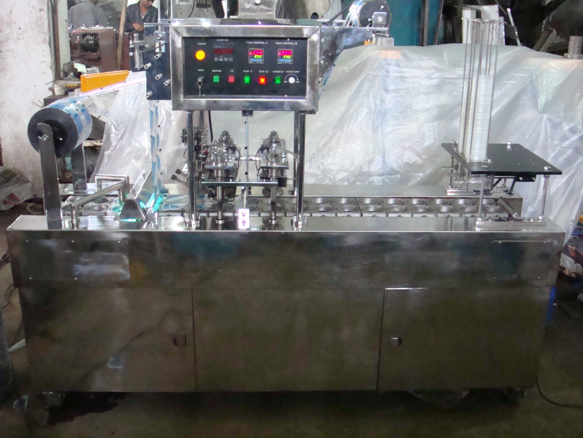 Manufacturers Exporters and Wholesale Suppliers of Cup Filling Machine Roll T Ambala Haryana Cup Filling Machine Roll T