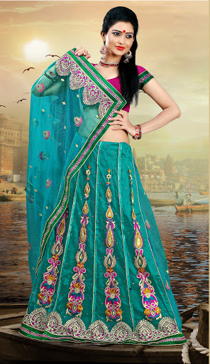 Manufacturers Exporters and Wholesale Suppliers of Teal Bright Net Saree SURAT Gujarat