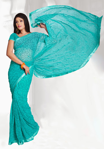 Manufacturers Exporters and Wholesale Suppliers of Teal Colored Georgette Saree SURAT Gujarat