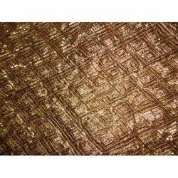 Manufacturers Exporters and Wholesale Suppliers of Golden Sequin Fabric Surat Gujarat